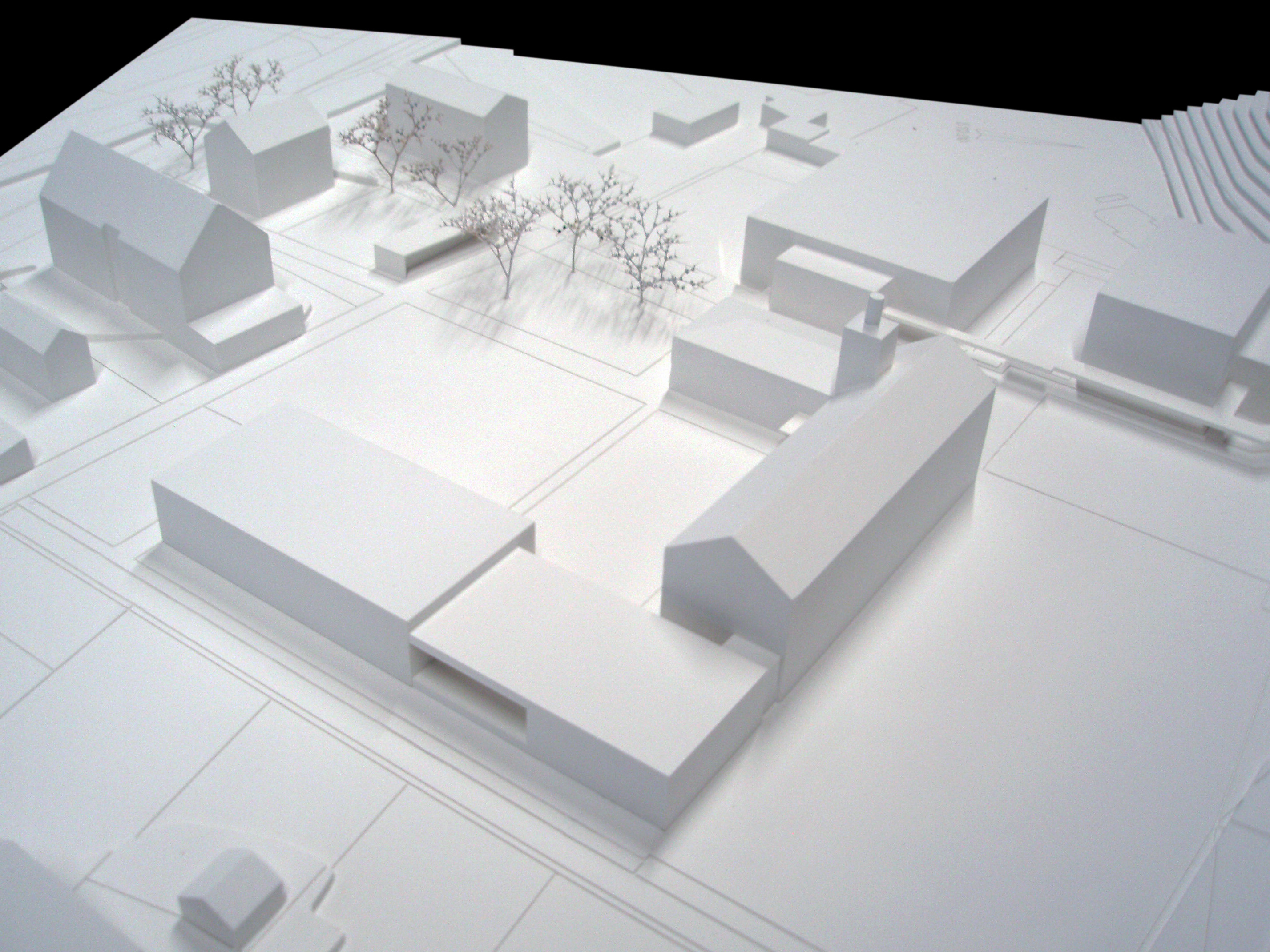 Modellfoto - Verbingung von altem Schulhaus mit Schulhauserweiterungsbau